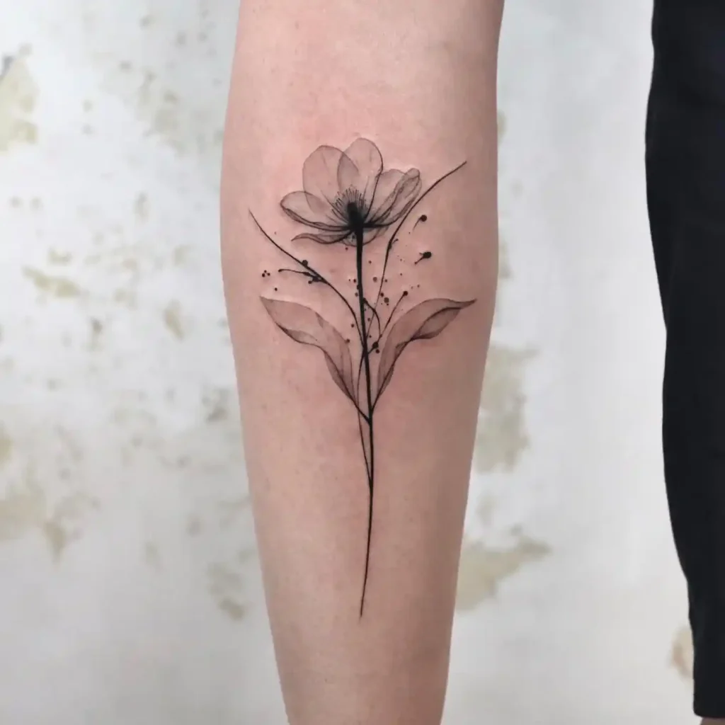 Abstract Blackwork Poppy Tattoo Over Woman’s Biceps