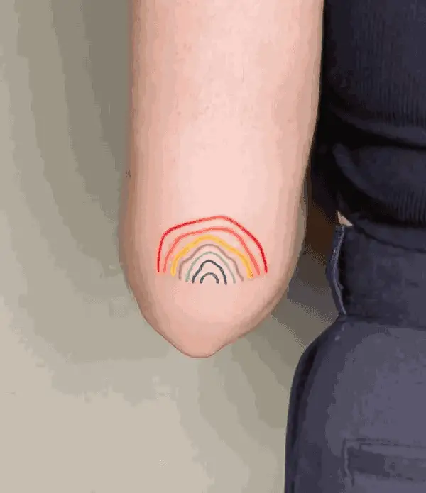 Hand-Drawn Rainbow Tattoo On Elbow