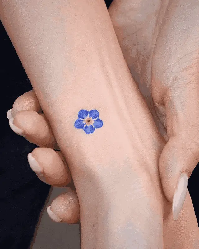 Small Flower Tattoo on Hand