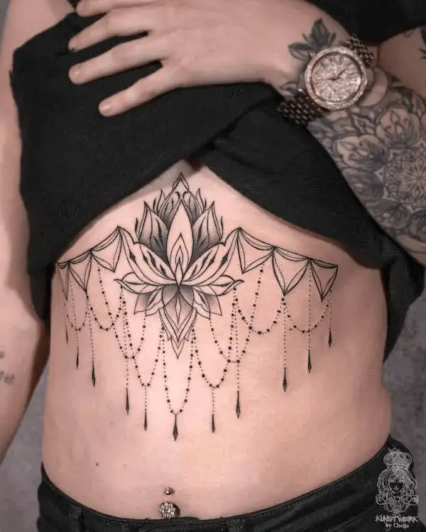 Bold Lotus Sternum Tattoo
