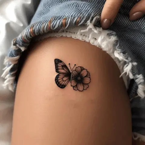 Deep Half Flower Half Butterfly Tattoo On Thigh