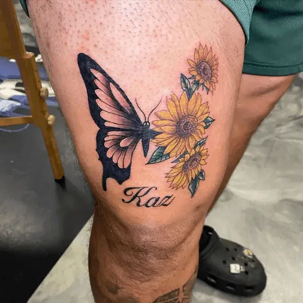 Half Butterfly Half Flower Above Knee Tattoo