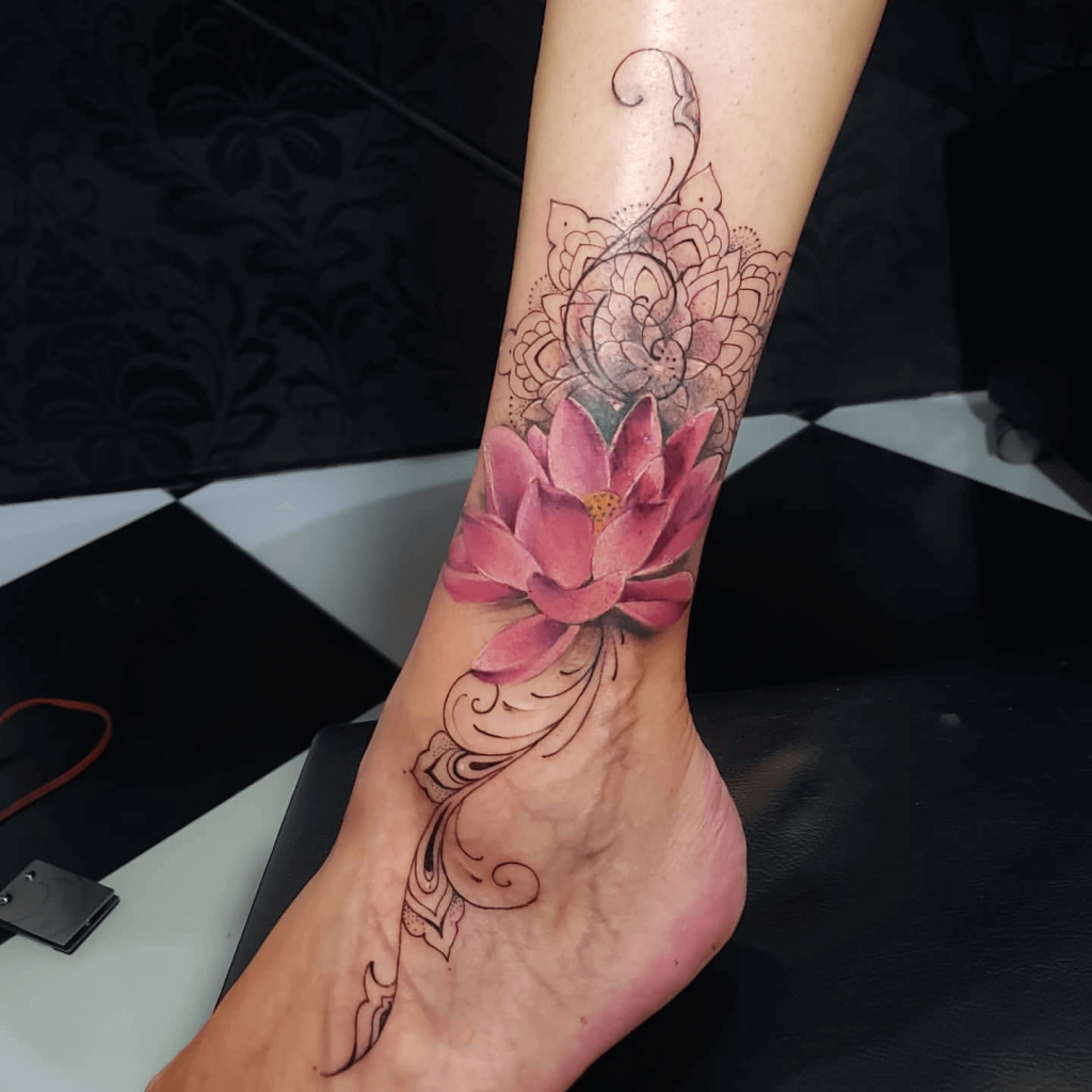 Realistic Pink Lotus Flower Tattoo With Mandala on Woman’s Ankle