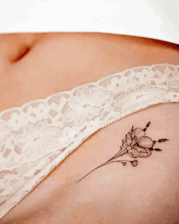 Small Flower Hip Tattoo