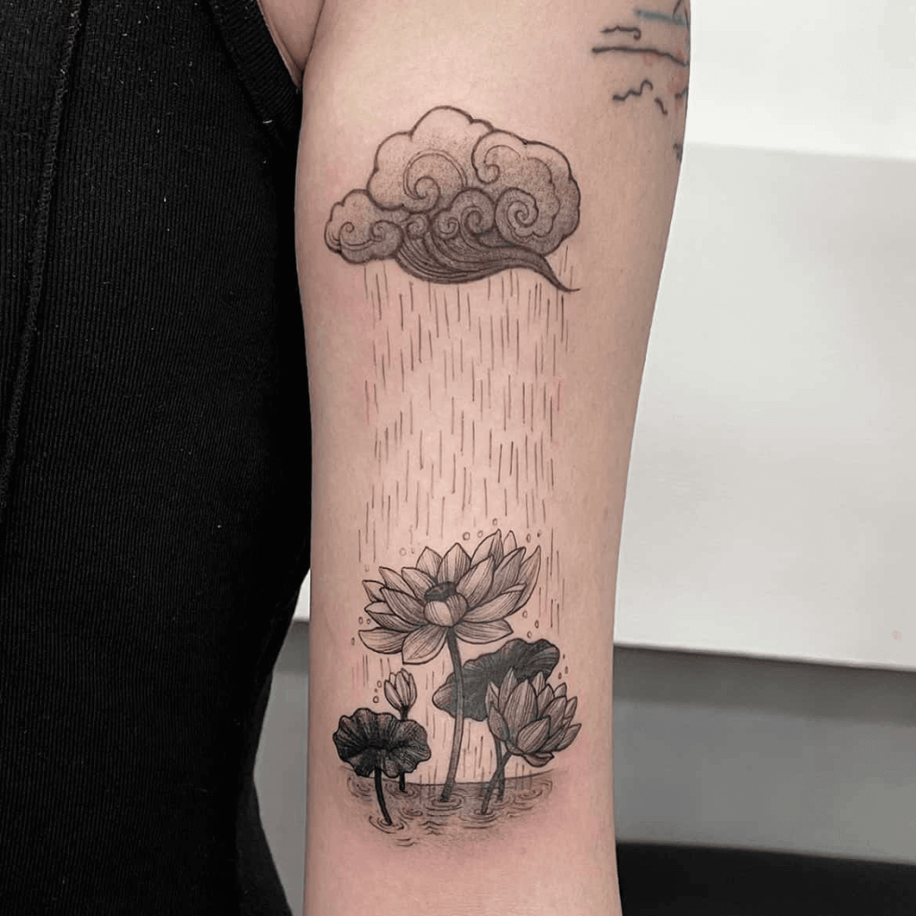 Unique Lotus Flower Tattoo on Woman’s Biceps