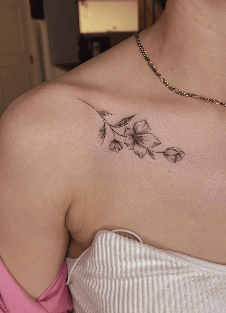 Blooming Flowers Collarbone Tattoo