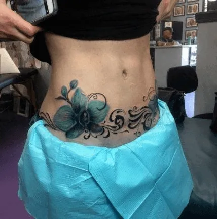 Blue Tummy Tuck Tattoo