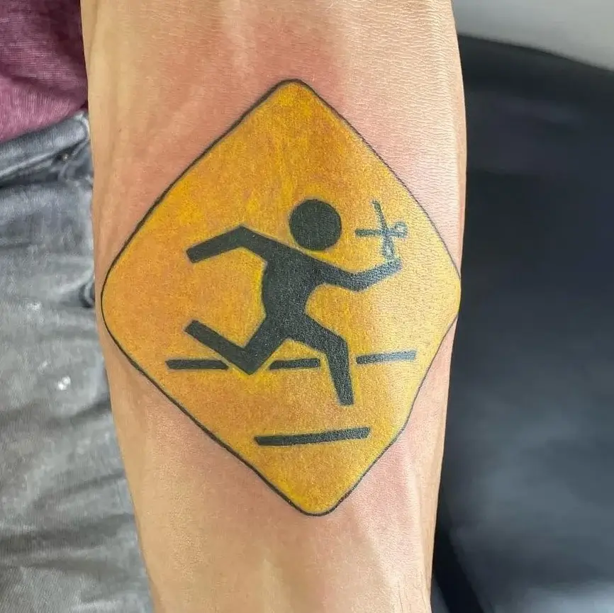 Captivating ‘Don’t Run’ Street Sign Tattoos