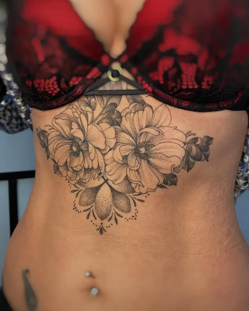 Floral Design with Delicate Dotwork Stomach Tattoo