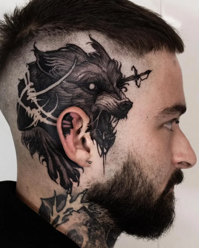 Impressive Blackwork Wolf Head Tattoo
