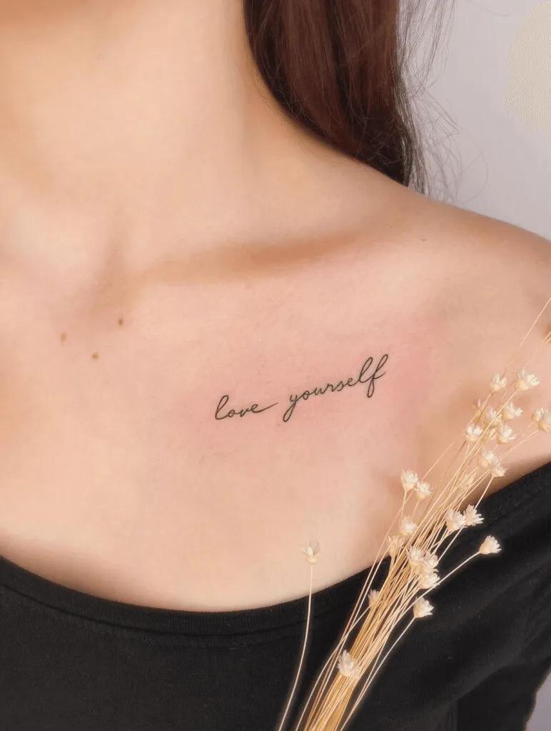 "Love Yourself" Cursive Collarbone Tattoo