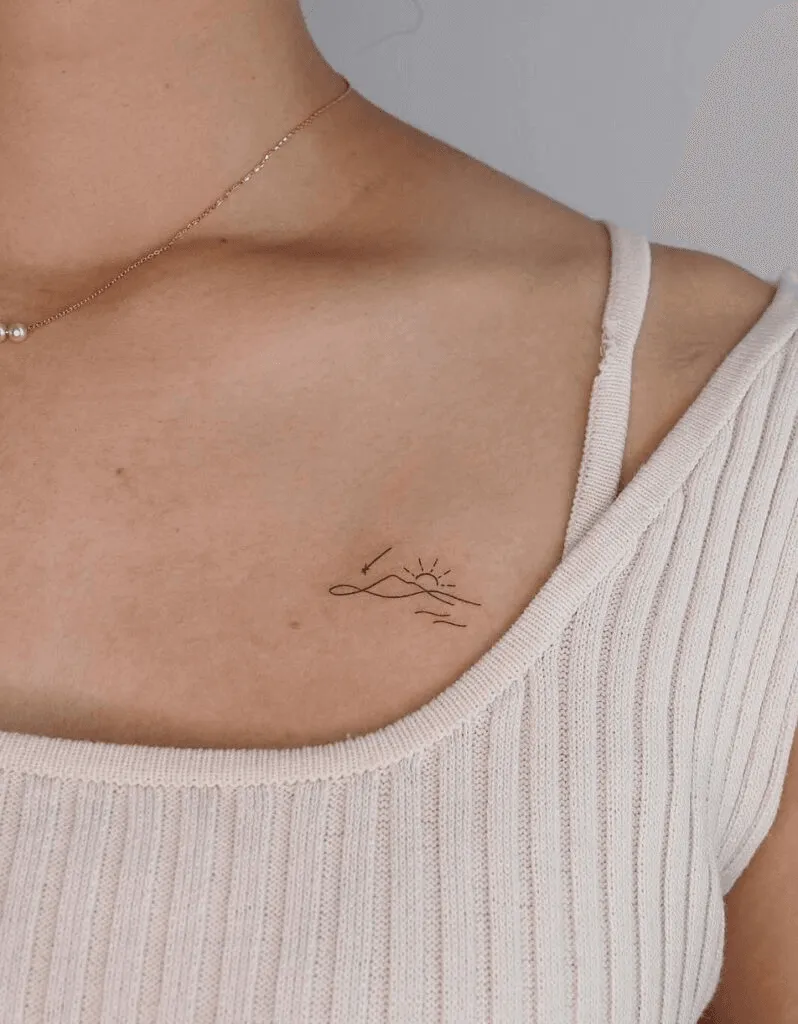 Mountain, Sun, And Ocean Tiny Collarbone Tattoo