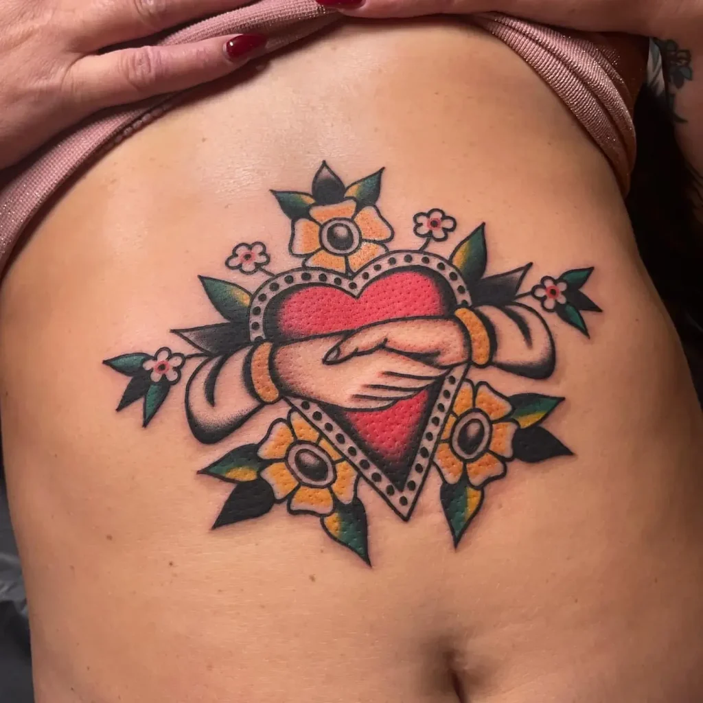 Old School Embraced Heart Floral Stomach Tattoo