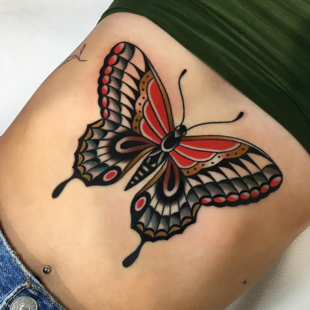 Vibrant Old School Butterfly Stomach Tattoo