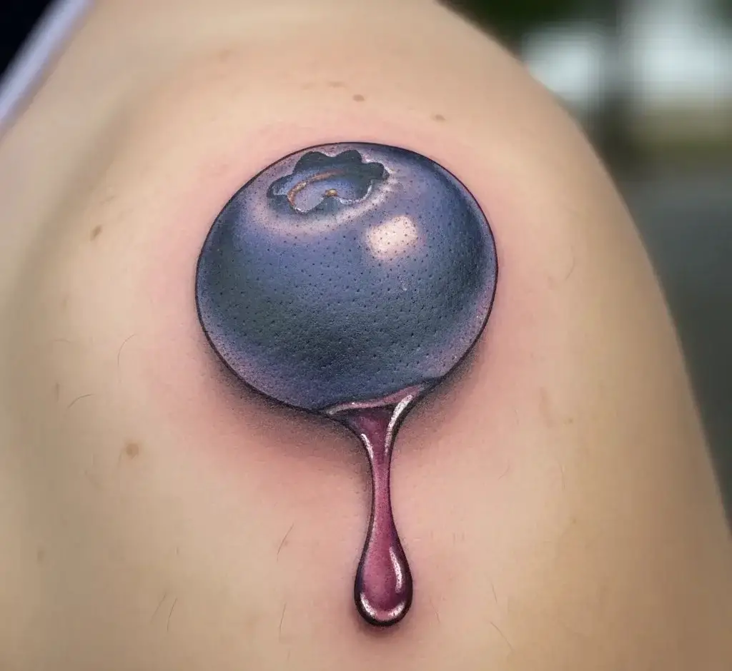 Single Blueberry with Drop of Juice