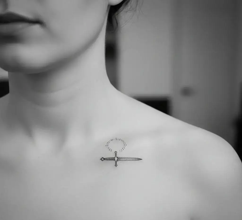 Minimalist Sword and Halo Tattoo