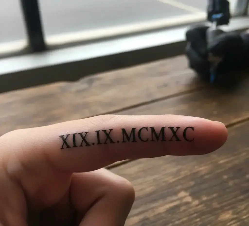 Roman Numerals Tattoo