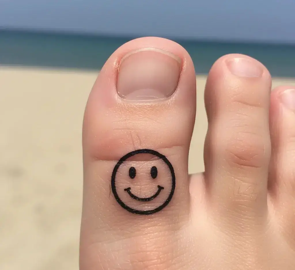 Smiley Face Tattoo