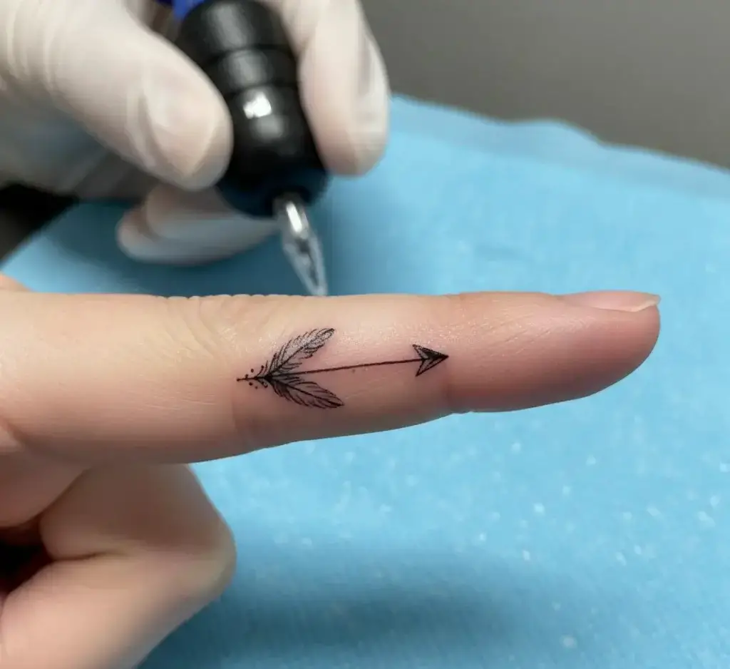 Tiny Arrow Tattoo