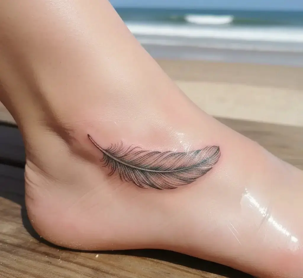 Tiny Feather Tattoo
