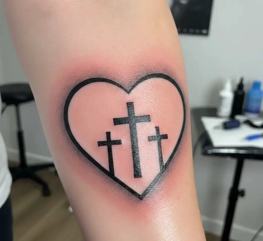 Three Crosses Inside a Heart