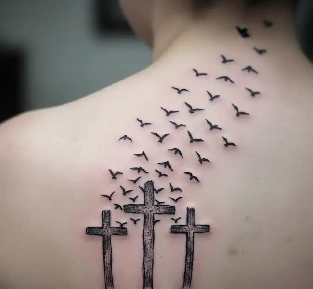 Three Crosses with Birds Flying