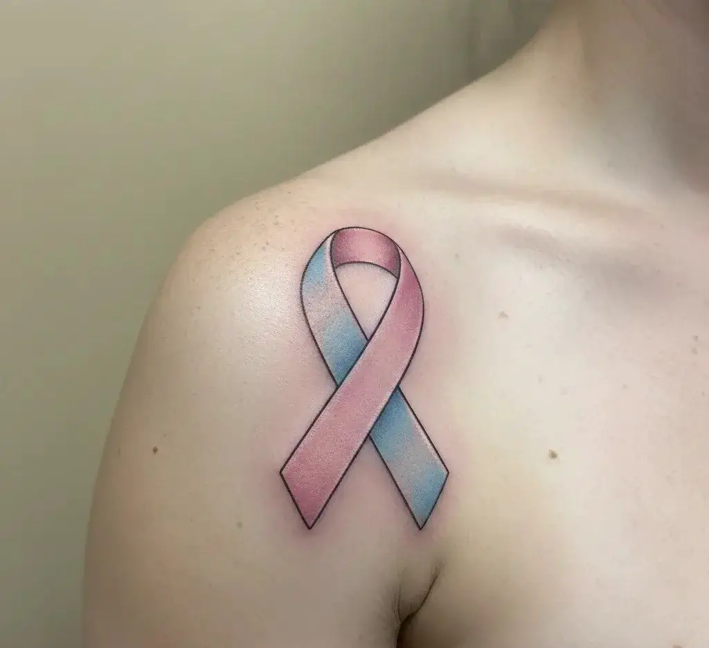 What Health or Awareness Issues Are Linked to a Pink and Blue Ribbon Tattoo?