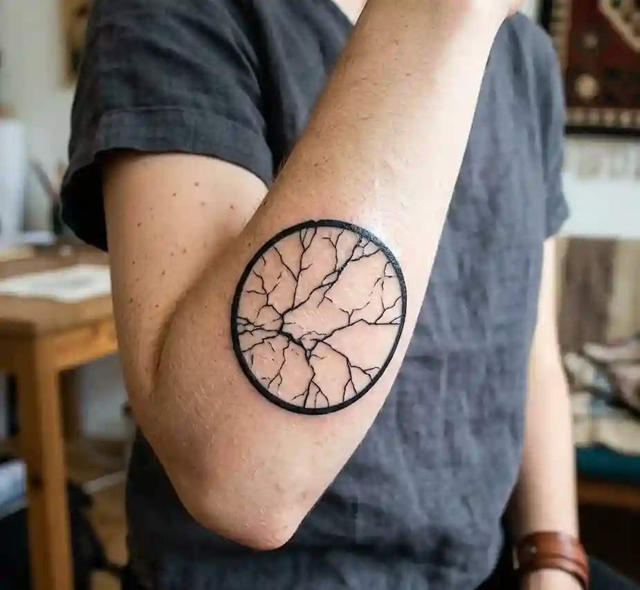 Cracked Circle Tattoo