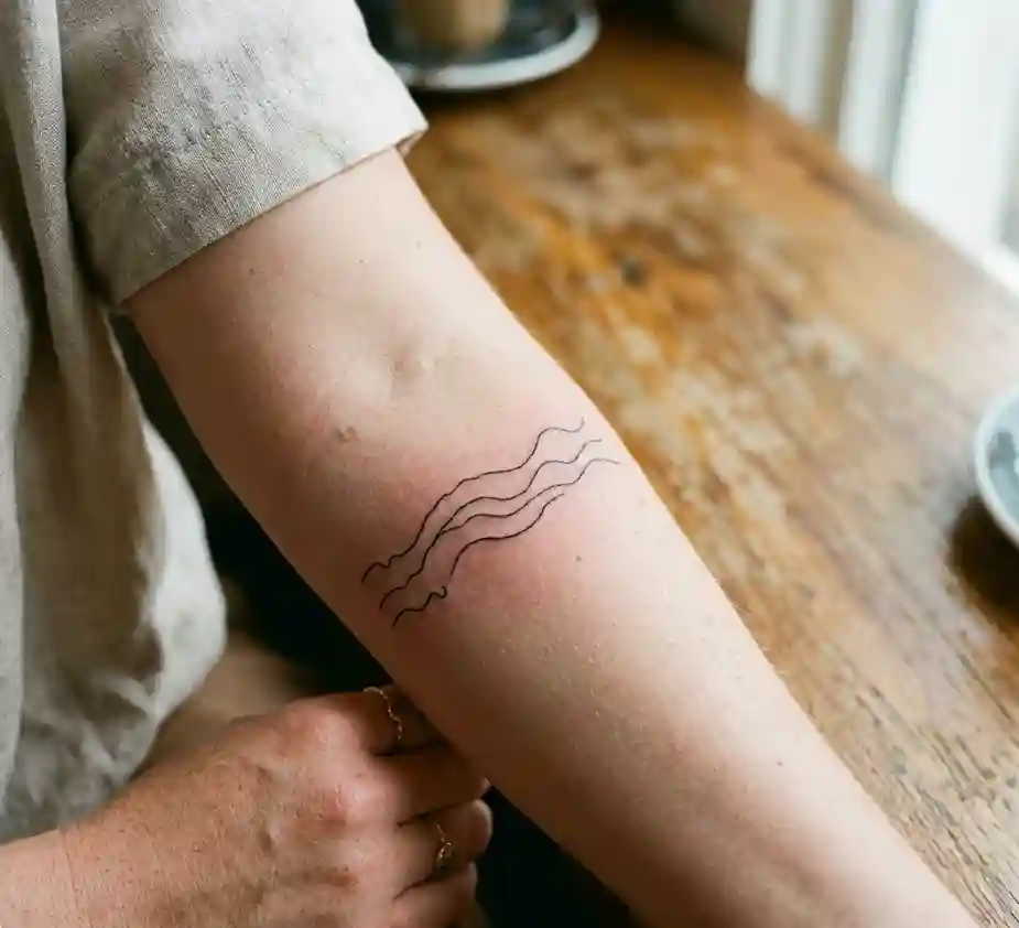Wavy Line Tattoo